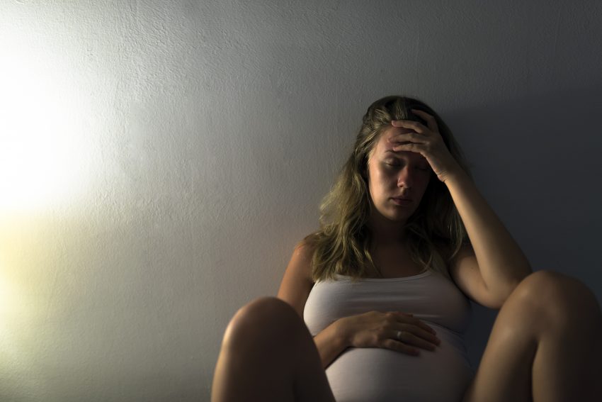 Young tired, Sleepless and depressed, Pregnant woman scared on nightmares looking sad worried and stressed